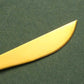 couteau doré et bois